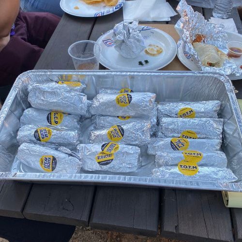 picnic table with food trays
